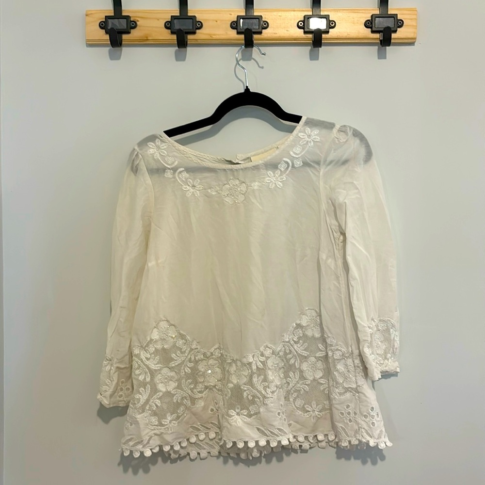 Beautiful white blouse with flower embroidery